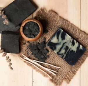 a black and white soap on a burlap surface